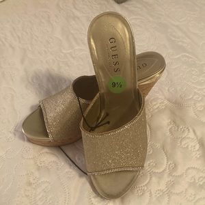 Guess wedges size 9.5 gold and cork never worn great for the warmer weather